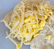 Egg and potato stir-fry wrapped in flatbread