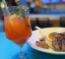 Pan-Seared Beef Patty with Foie Gras and Seasonal Vegetables