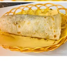 Egg-filled flatbread wrap