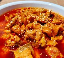 Stir-Fried Pig Intestines and Chicken in Iron Pot