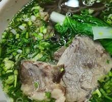 Hand-extruded noodle soup