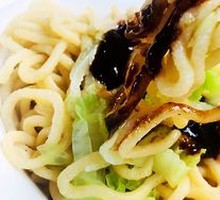 Hand-extruded noodle soup