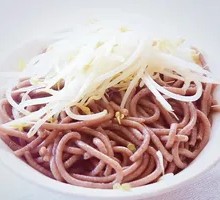 Hand-extruded noodle soup