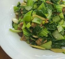 Stir-fried bok choy with fried pork scraps