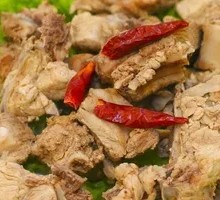 Stewed Pork Ribs and Chicken Feet in Iron Pot