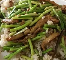 Stir-fried Garlic Shoots with Pork over Rice
