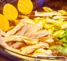 Stewed Rooster in Iron Pot