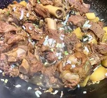 Stewed Beef Bones in Iron Pot