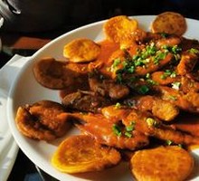 Pan-fried corn cakes with small fish stew