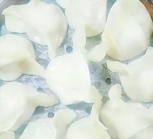 Steamed Pork Dumplings with Side Dishes