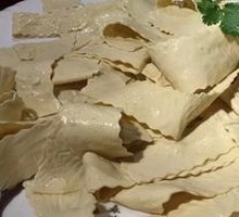 Oil-soaked tofu skin