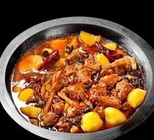 Stewed Rooster in Iron Pot