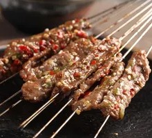 Sliced Beef with Green and Red Peppers