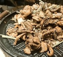 Grilled Meat on Iron Skillet