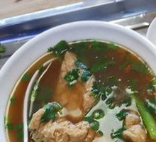 Fried Triangular Tofu Puffs in Soup
