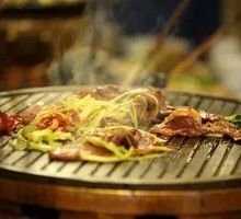 Grilled Meat on Iron Skillet