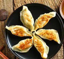 Pan-Fried Pork and Pickled Vegetable Dumplings