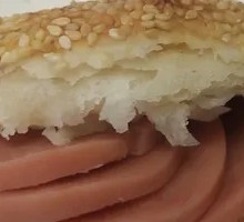 Braised flatbread with sausage