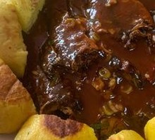 Pan-fried corn cakes with small fish stew