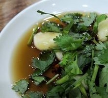 Pickled garlic with chili and cilantro