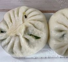 Two scallion and shrimp dumplings