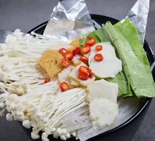 Aluminum-Wrapped Enoki Mushrooms with Rice Noodles