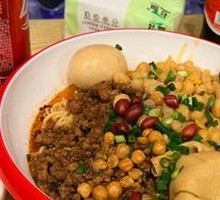 Signature Spicy Noodles with Peas and Pork