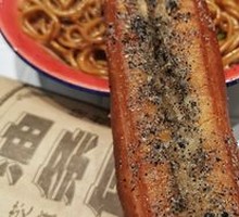Oil-fried dough wrapped in rice cake