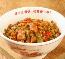 Dried lettuce with pork over rice