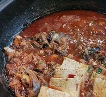 Stewed Fish Offal in Iron Pot