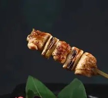 Salt-grilled chicken skewers with scallions