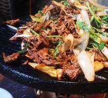 Grilled Meat on Iron Skillet