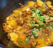 Stir-Fried Rooster in Iron Pot