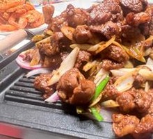 Grilled Meat on Iron Skillet