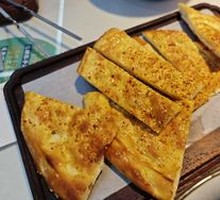 Tandoor-roasted lamb leg