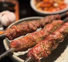 Lamb Skewers on Red Willow Branches