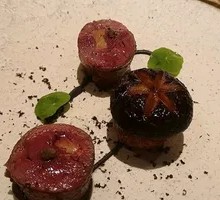 Charcoal-Grilled Pigeon Breast with Black Olives and Yuzu Pepper