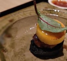 Pan-Seared Foie Gras with Caramelized Mango and Activated Charcoal Bread