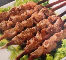 Lamb Skewers on Red Willow Branches