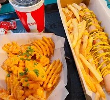 Crispy Potato Strips with Cheese Sauce