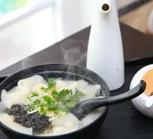 Pork and scallion dumplings