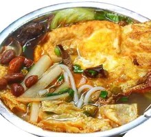 Fried Egg with Tofu Puffs and Snail Noodles