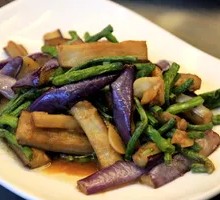 Eggplant and green bean stir-fry over rice