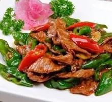 Stir-Fried Pork with Green Peppers over Rice