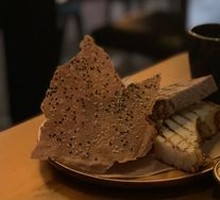 Fresh Homemade Bread Basket with Carrot Butter