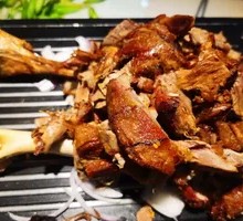 Tandoor-roasted lamb leg