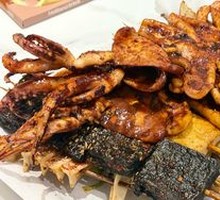 Grilled Skewers on Iron Plate