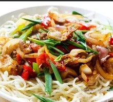 Onion Stir-Fry with Pork over Noodles