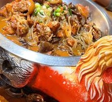 Free-range rooster stew with mushrooms and vermicelli