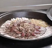 Stewed Pork Dish in Iron Pot